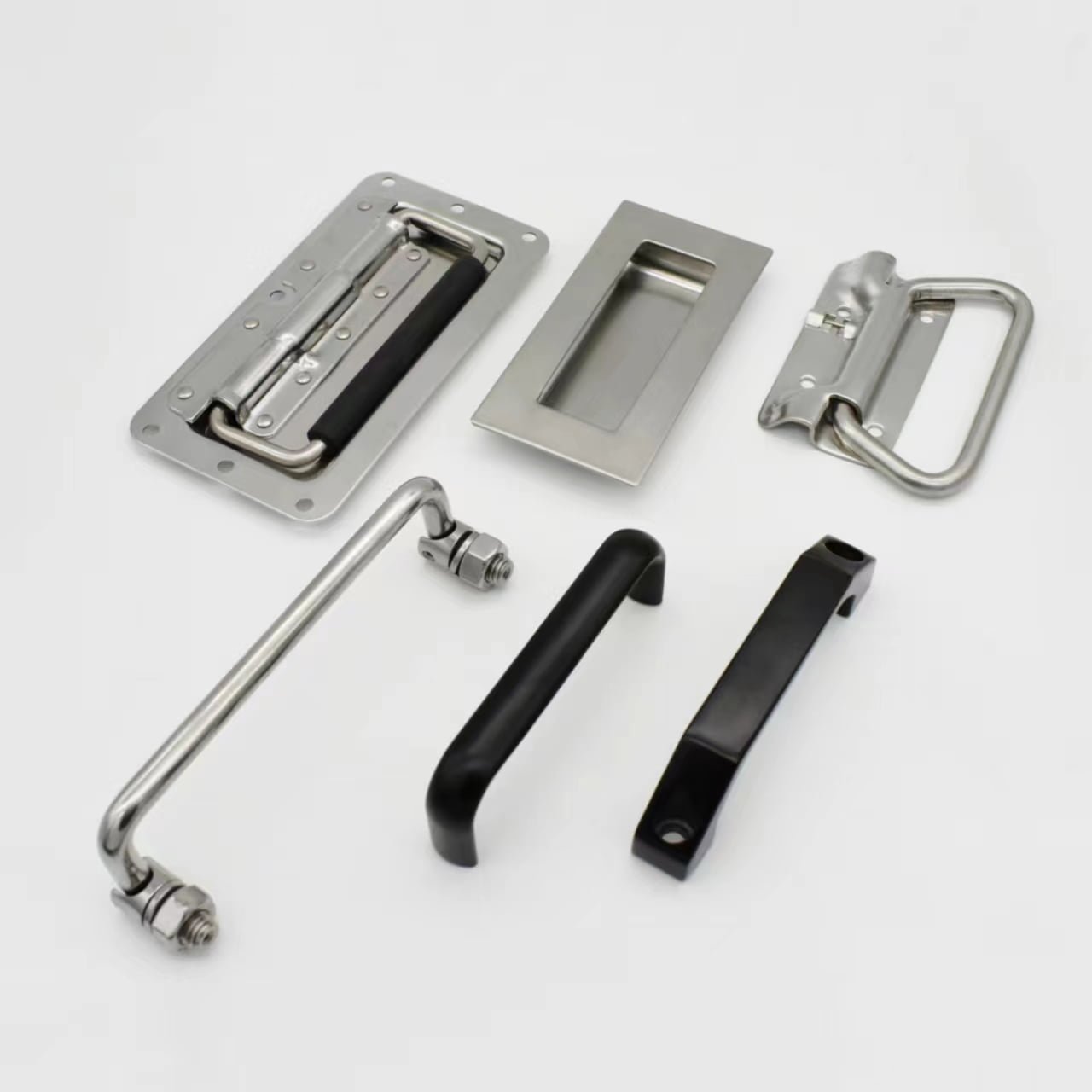 Various "hamdle" metal handles, including a recessed pull, a rectangular flush pull, a folding handle, and two tubular handles, are arranged neatly on a white background beside a Liang Jiang Cabinet Lock.