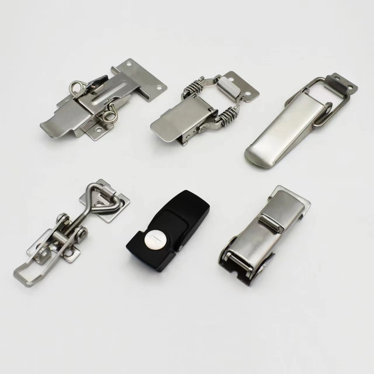 A variety of six metal toggle latches, including the Liang Jiang Cabinet Lock, are displayed on a plain white background.