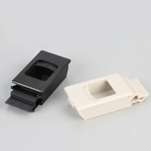 Two 124-0 rectangular plastic mounts, one in black and the other in white, are positioned on a flat surface with each featuring a centered cutout.