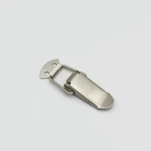129-0 features a sleek silver metal latch clasp with a minimalist rectangular design, set against a light gray background.