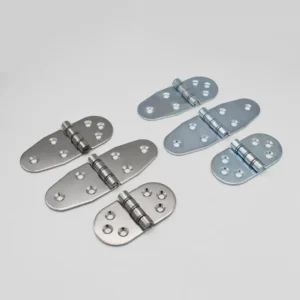 Six 33-0 butterfly hinges arranged on a white surface.