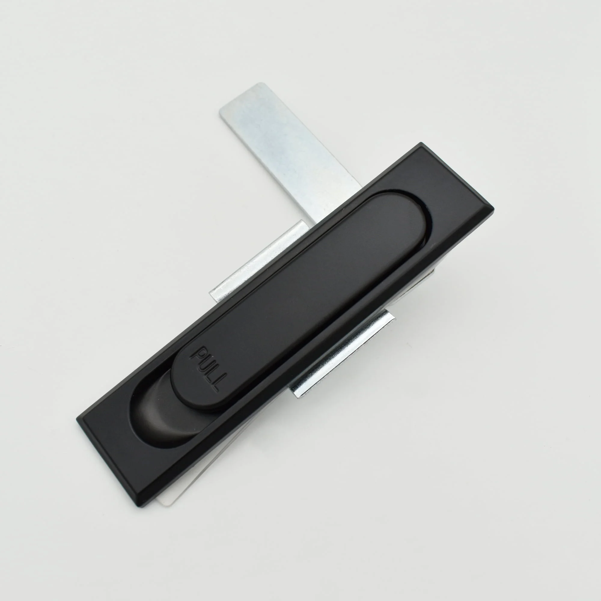 The DSC_2176, a sleek black flush sliding door pull handle featuring a brushed metal mounting plate elegantly inscribed with "PULL," adds a touch of sophistication by seamlessly blending function and style.