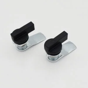 Two MS406 metal cam locks with black plastic handles are positioned side by side on a white surface.