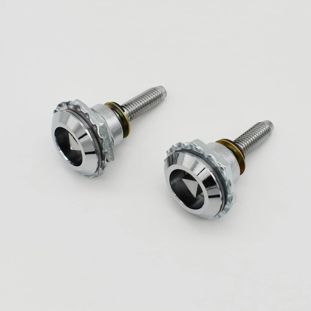 Two MS704 metal screws (1) with hexagonal sockets and cylindrical bolts are placed side by side on a plain white background.