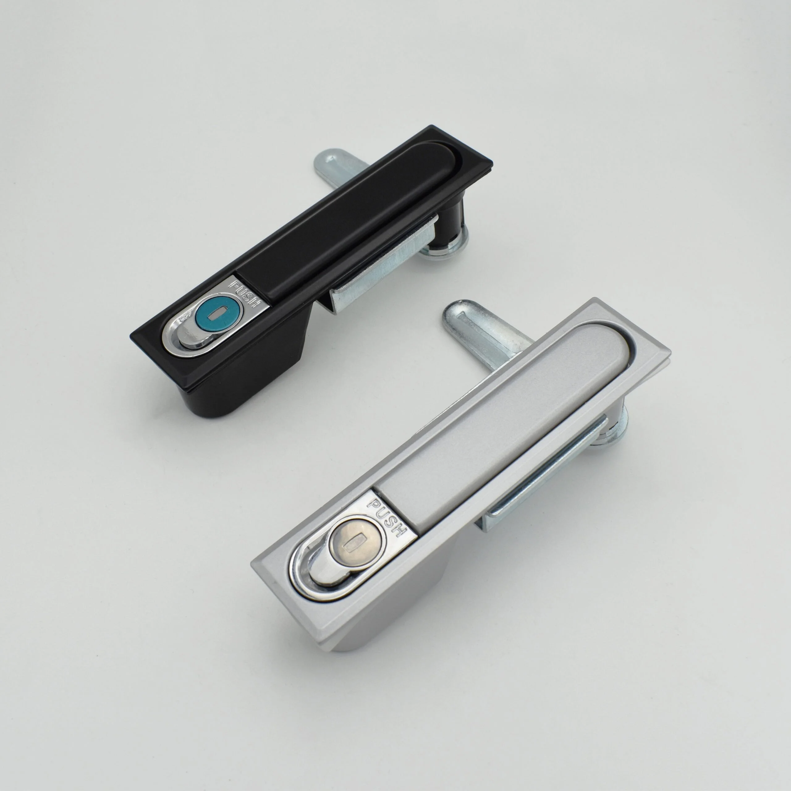 MS818 (1) black and silver push-button door handles on a light gray background.