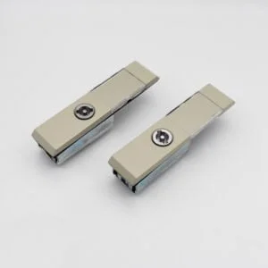 Model MS821 (1) consists of two beige metal clips with silver fasteners, elegantly positioned on a pristine white background.