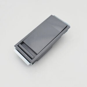The MS887 is a sleek rectangular grey object made from plastic, characterized by its smooth surface and a foldable section.