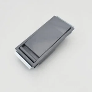 The MS887 is a sleek rectangular grey object made from plastic, characterized by its smooth surface and a foldable section.