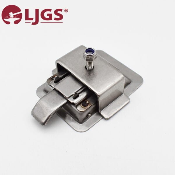 The 79c702a8-0977-4106-a2da-5fc4e88dcd6e metal latch features a rectangular base and a protruding lever with a screw on top. The brand logo is prominently displayed in the upper left corner, highlighting its quality and craftsmanship.